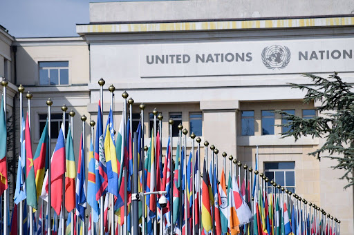 National flags fly outside the United Nations Office at Geneva, Switzerland, where the 68th session of the UN Sub-Committee of Experts on the Transport of Dangerous Goods convened June 30 – July 8, 2026.